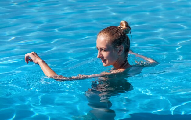 Naked Woman Swimming In Water